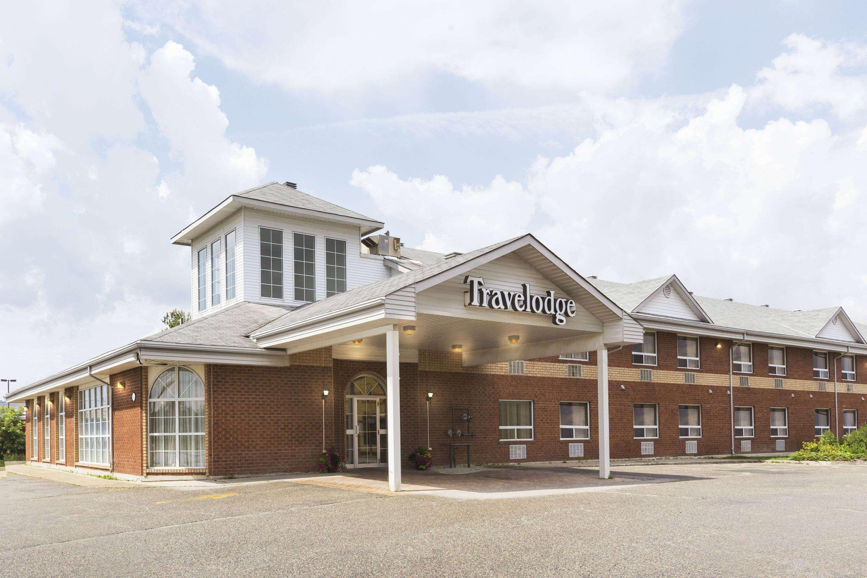 Travelodge By Wyndham Тимминс Экстерьер фото